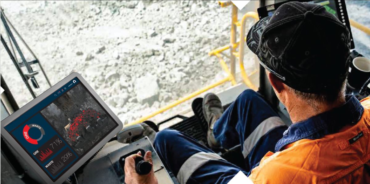 In-cab operator screen showing real-time ore and waste classification percentages